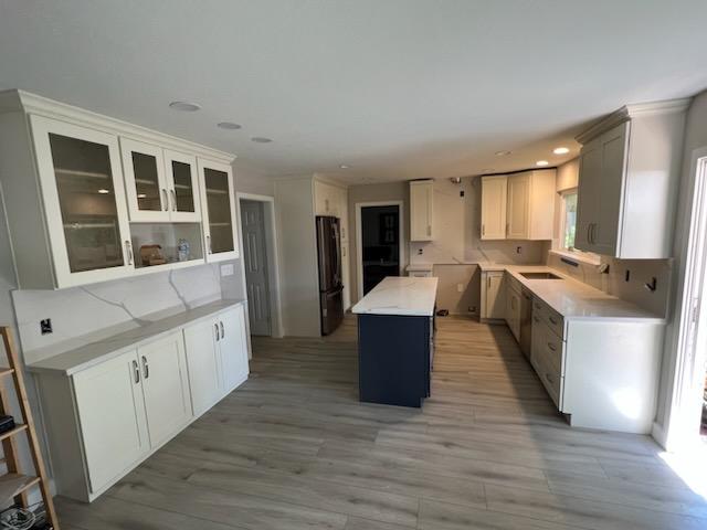 Full Kitchen Remodel — Marble Counters & Glass-Front Uppers