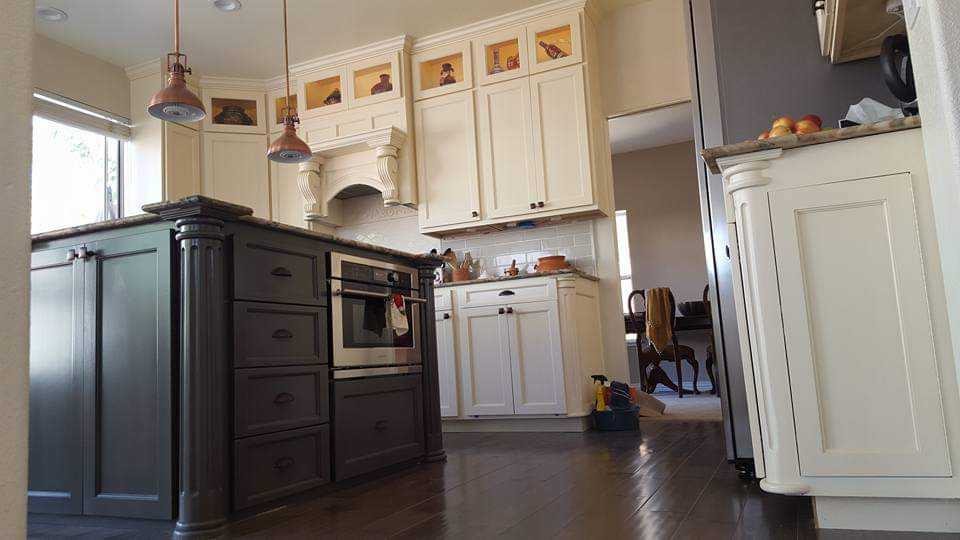 Traditional Kitchen — Espresso Island & Lighted Display Cubbies