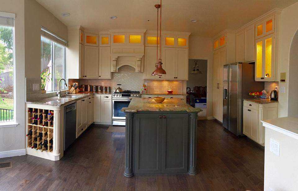 Cream Kitchen — Lit Glass Uppers & Copper Pendants