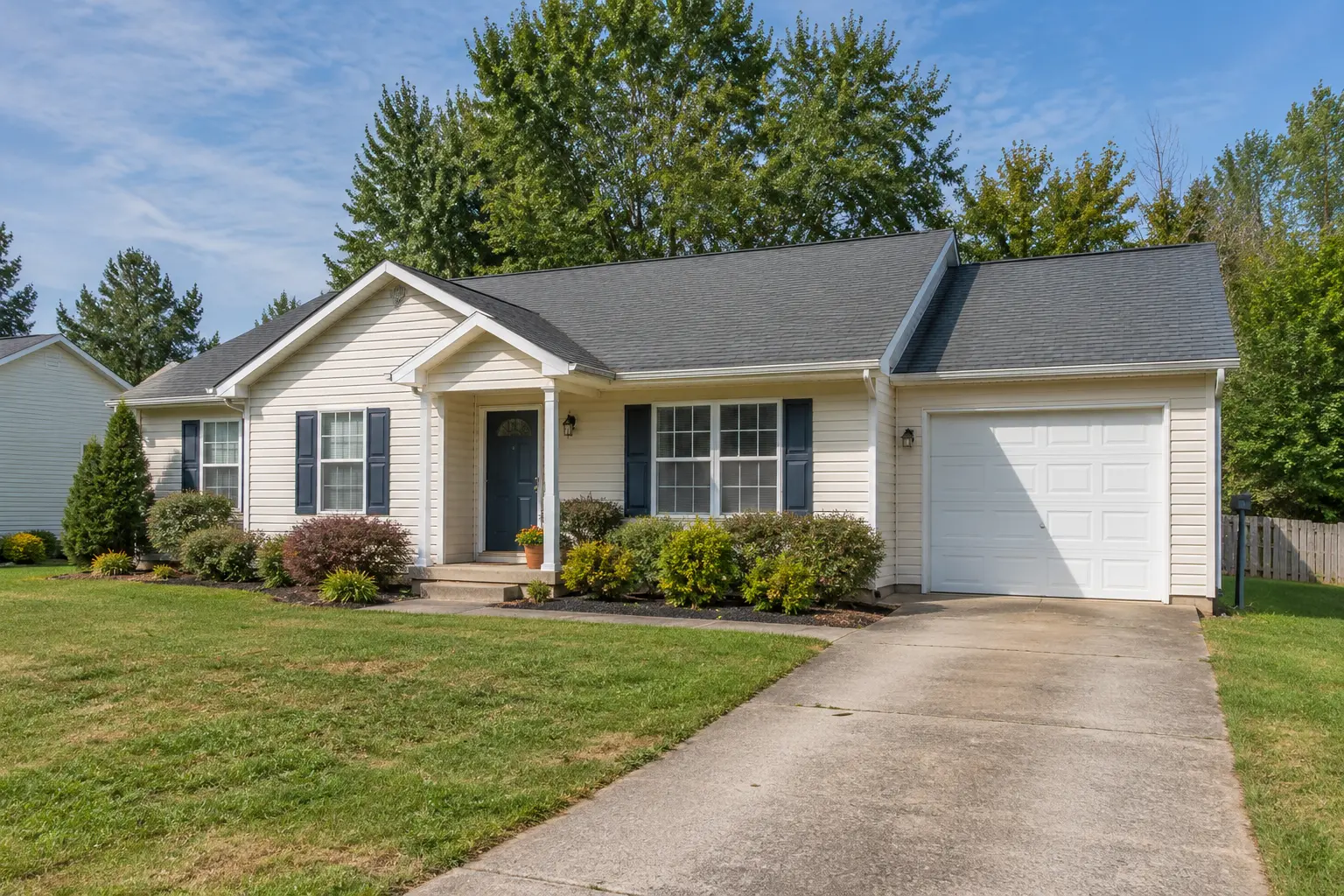 Ranch Home Remodel — New Siding, Shutters & Garage Door